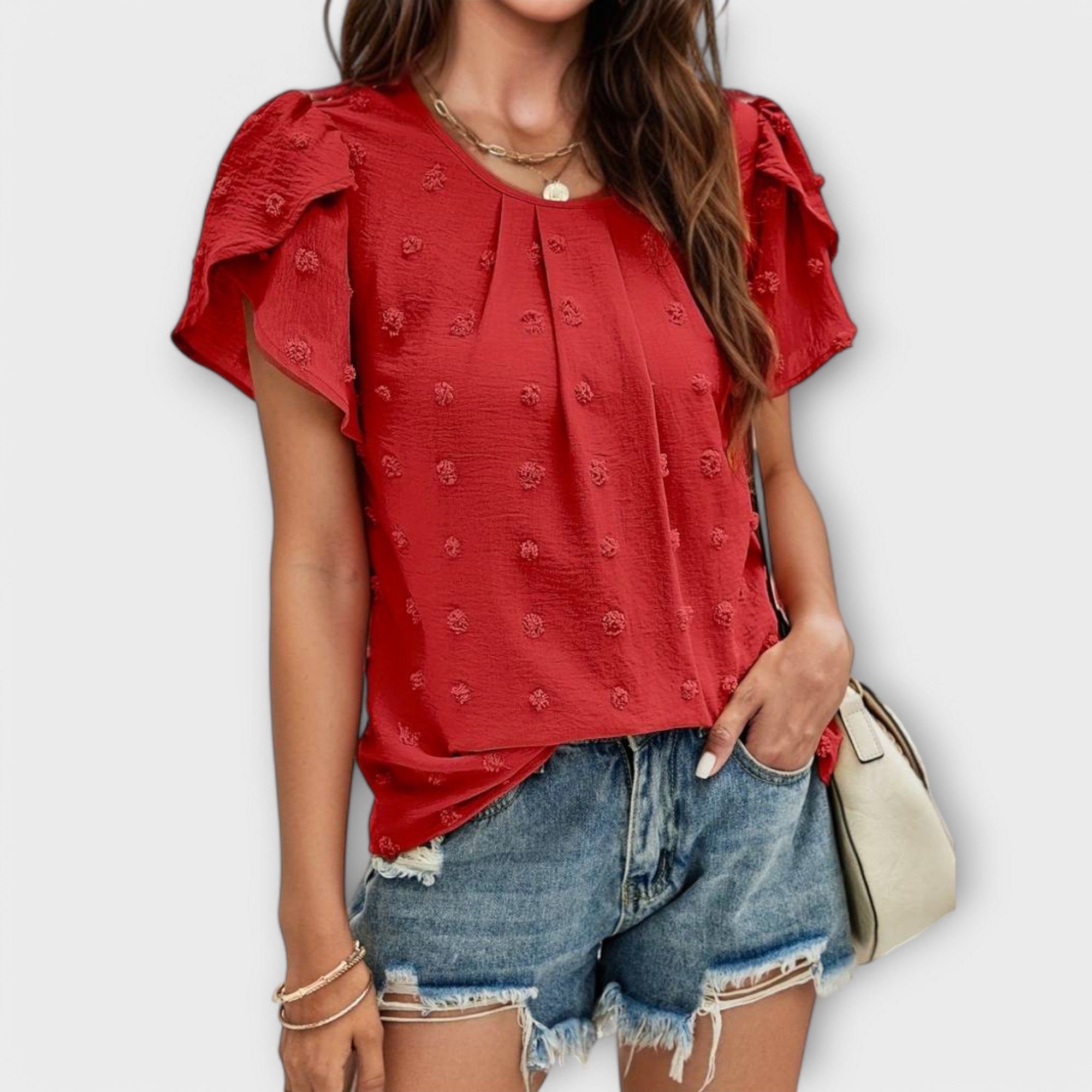 Charlotte - De perfecte blouse met polkadots