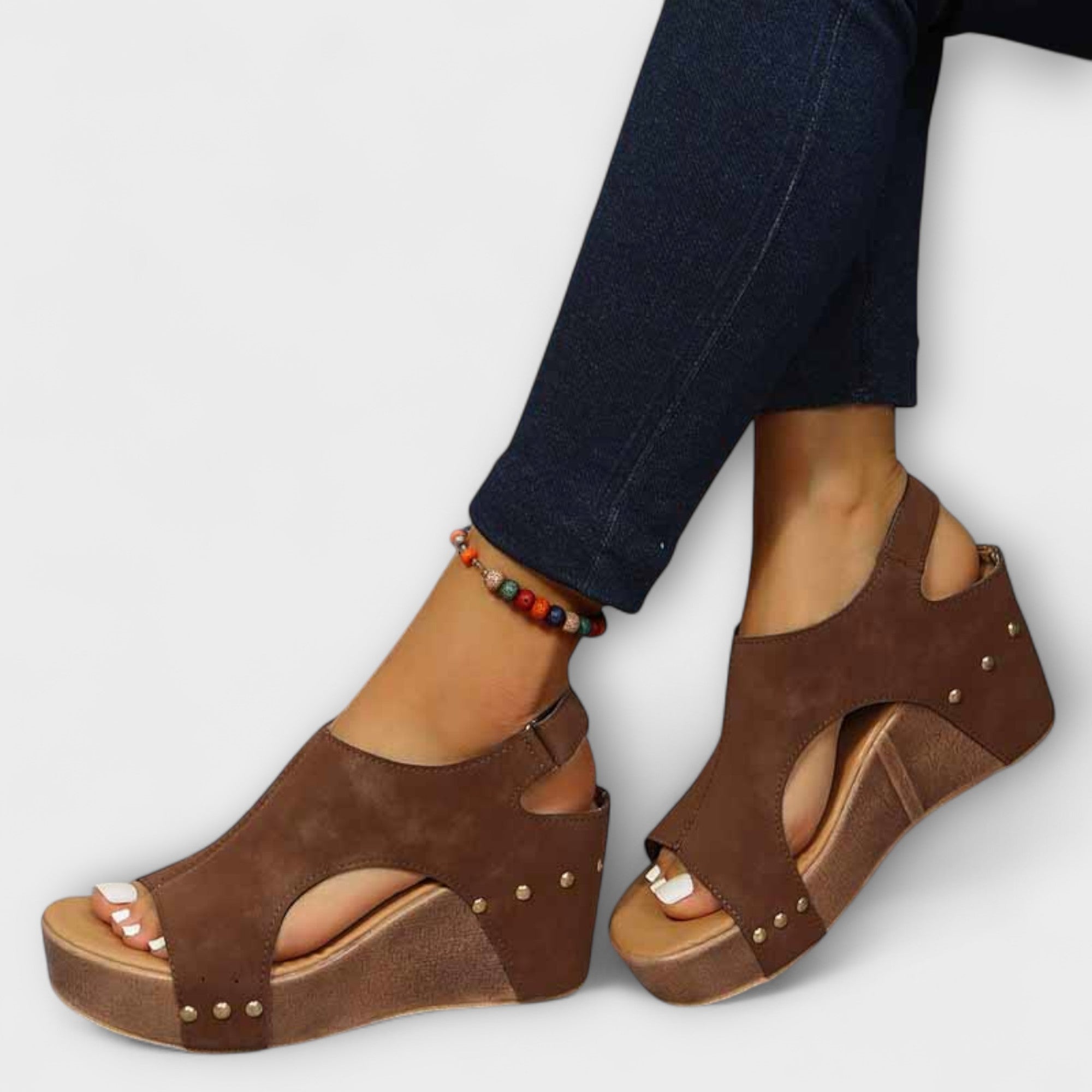 Evelyn - Metallic sleehak met studs