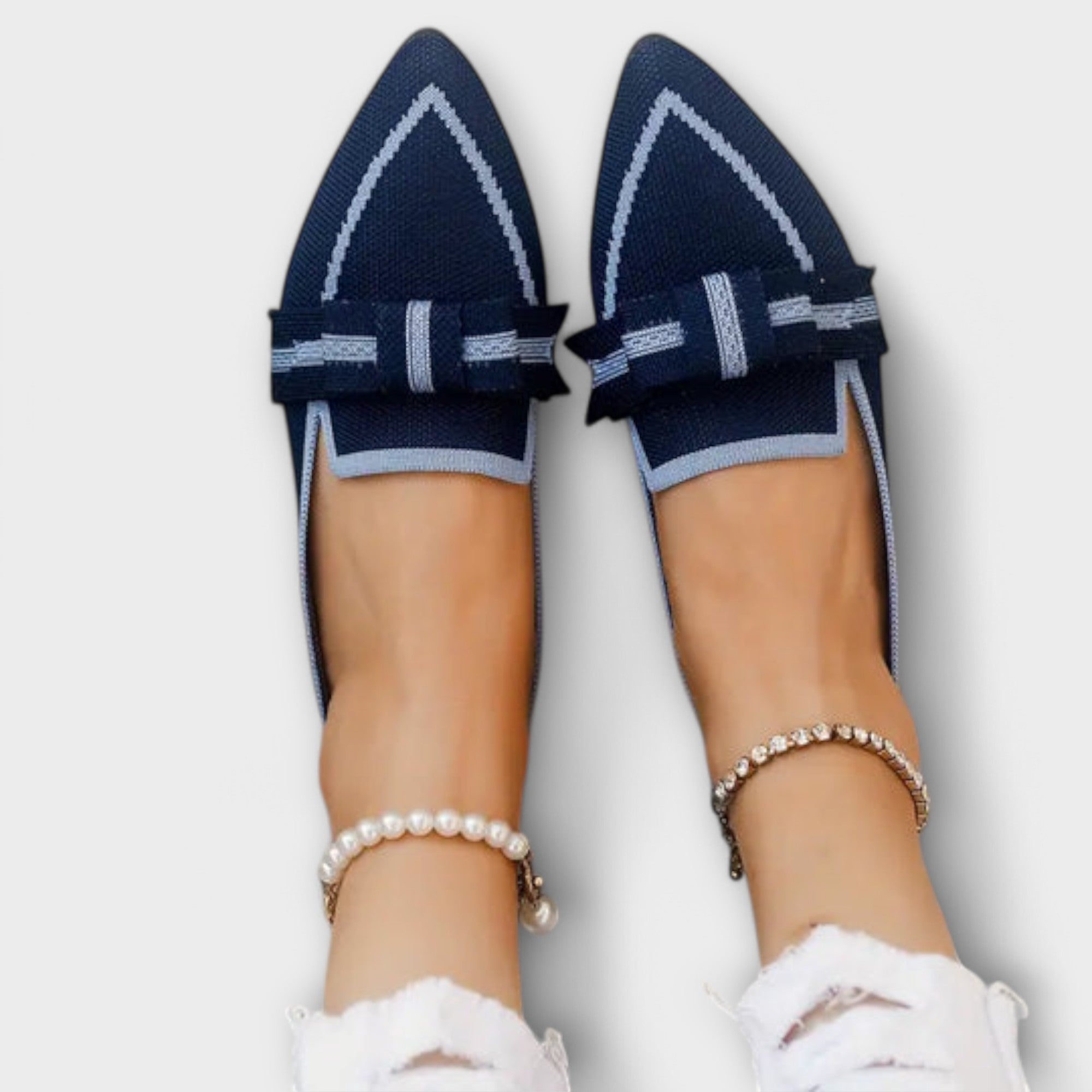 Platte damesschoenen met knoopdesign