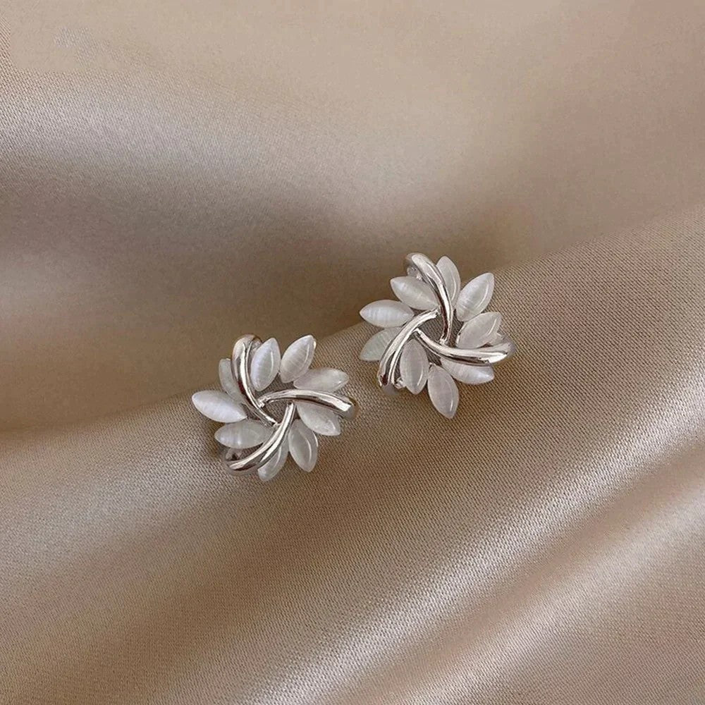 Elegante goudkleurige met prachtige opalen bloemmotieven