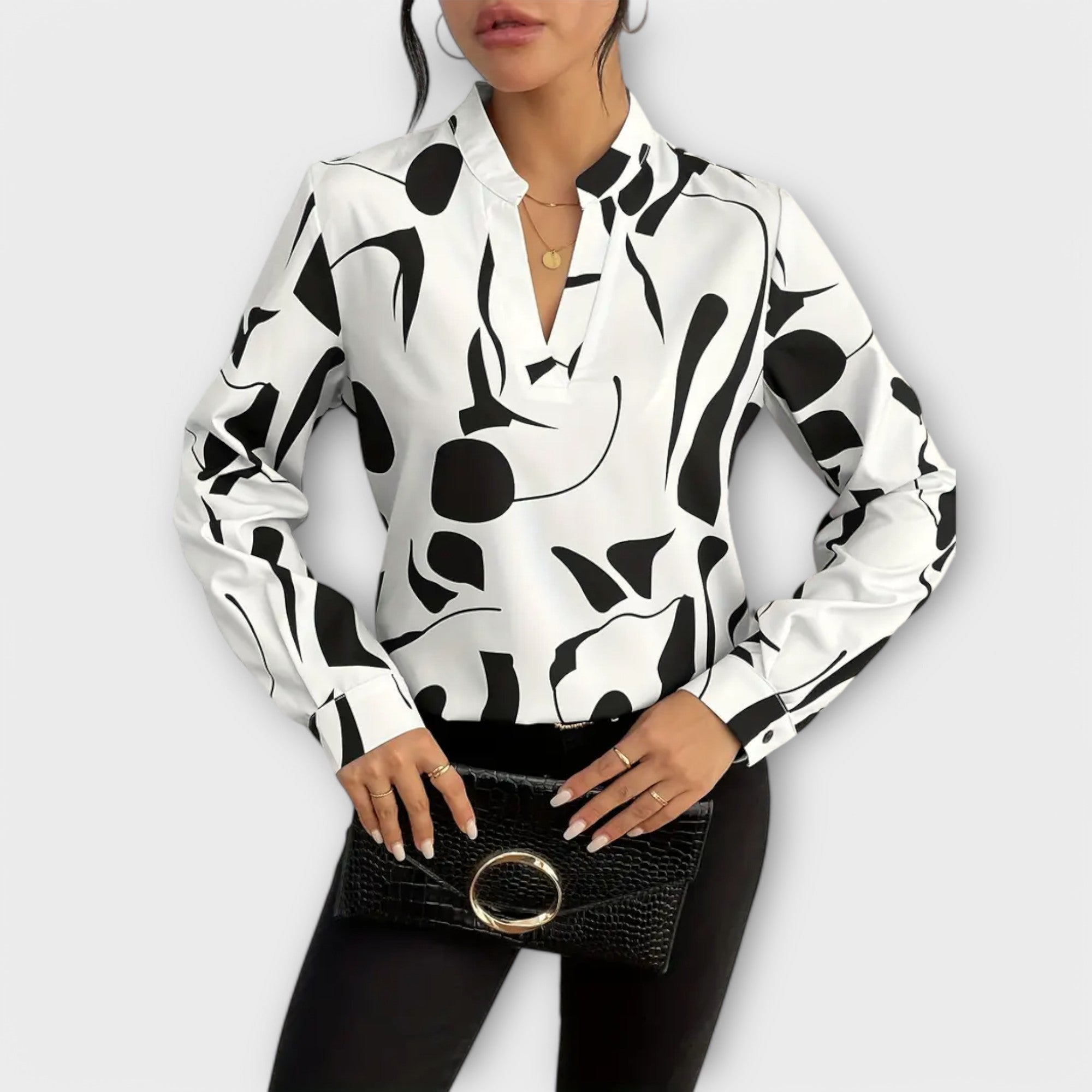 Edith - Elegante langmouwse blouse met puntige halslijn